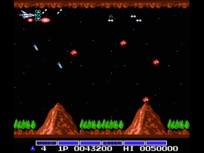 Pilot the Vic Viper space fighter jet through swarms of alien enemies in "Gradius."