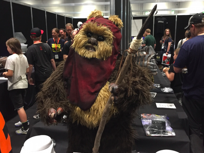 This ewok guarded the entrance to an exhibit of modified Scout Trooper helmets.