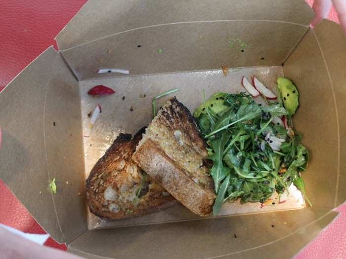 Our order from Postmates was not only last, but also the most disheveled. The bread slices were stacked with the avocado and greens flung to the side.