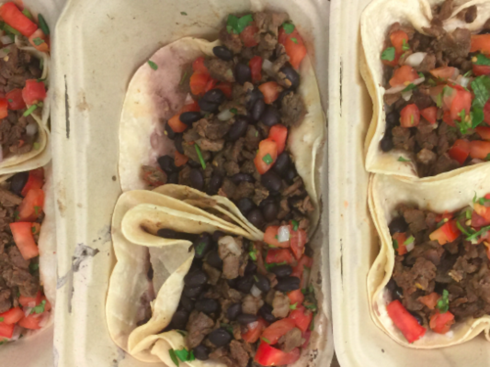 Tacos are already a bit messy, and the box from GrubHub got a little crunched. Looks aside, all three containers snuggled cradled warm tacos.