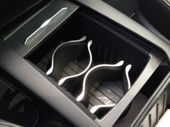 We had Tesla innovative, redesigned cupholders to keep us company ...