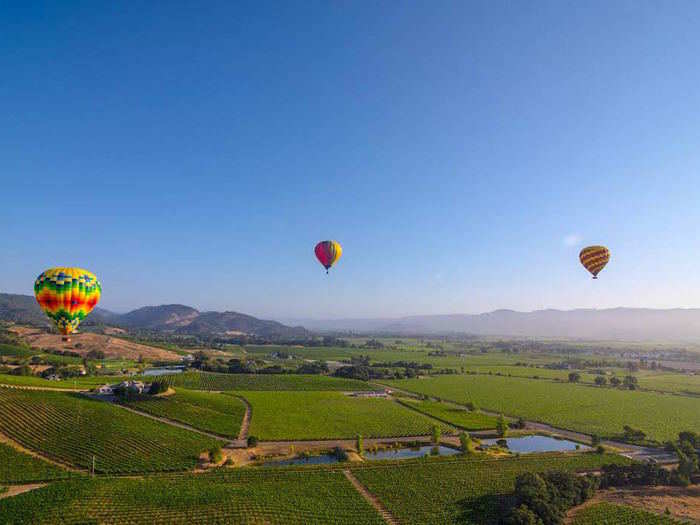 Take a sunrise hot air balloon ride through the picturesque Napa Valley.