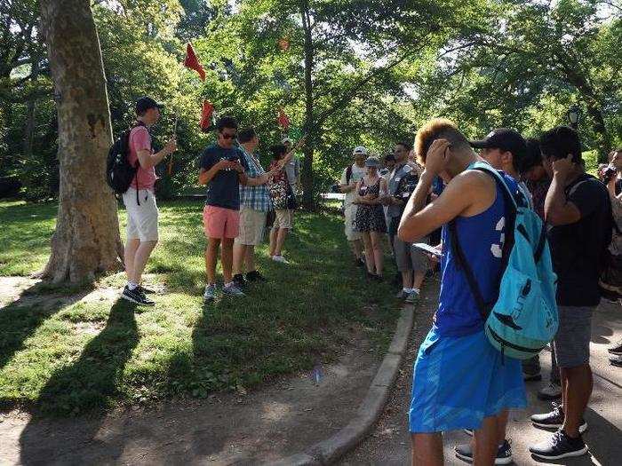 Most of the group remained buried in their phones as we made our way to the Conservatory Pond on the upper east side of the park. I overheard some people trading tips about the game and talking about what they had caught the day before.