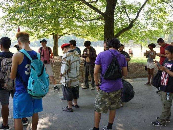 Everyone stopped walking to catch Pokémon next to a couple of Pokéstops near the south side of the Great Lawn.