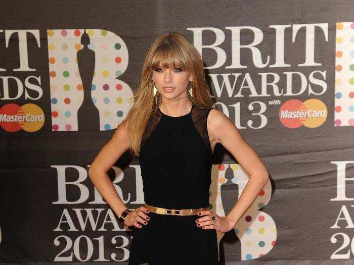 Slightly more revealing, Swift wore this black dress to the 2013 Brit Awards.