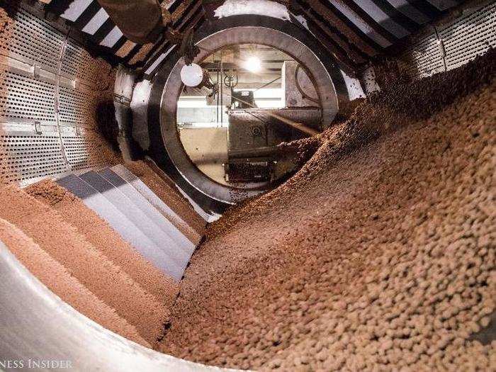 Next, the chocolates are sent through the cooling tunnels to ensure they are cooled and ready for the coloring process.