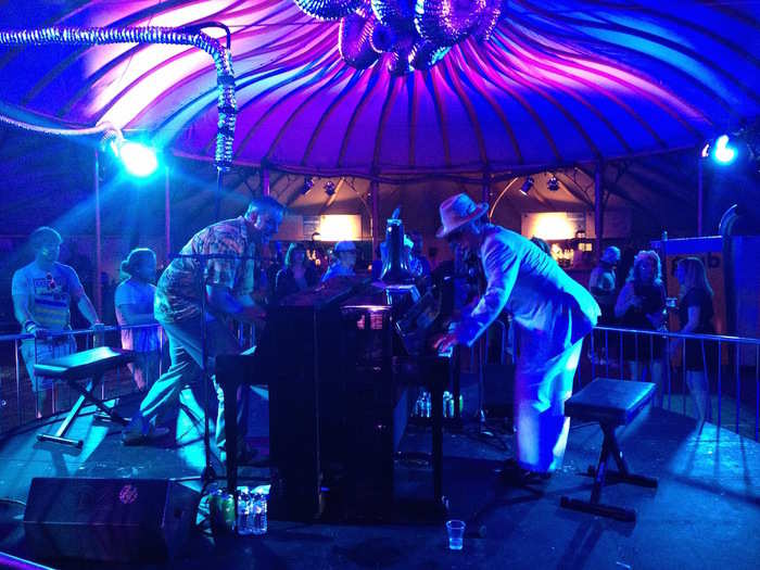 There were several pianos dotted about the festival venue, indoors and outdoors. In this bar tent, expert pianists entertained the crowd with a play-off.