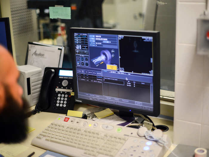 The machine, built for humans, displays a 3D rendering of a human body.