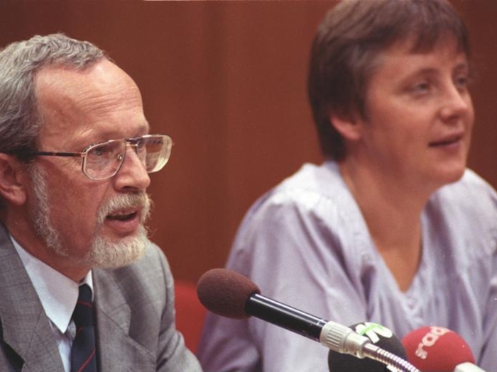 German Chancellor Angela Merkel with fellow Christian Democrat Lothar de Maiziere in 1990.