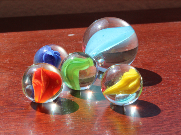 MARBLES: Ancient Egyptians, Greeks, and Romans all played with marbles in some form or another. Just don