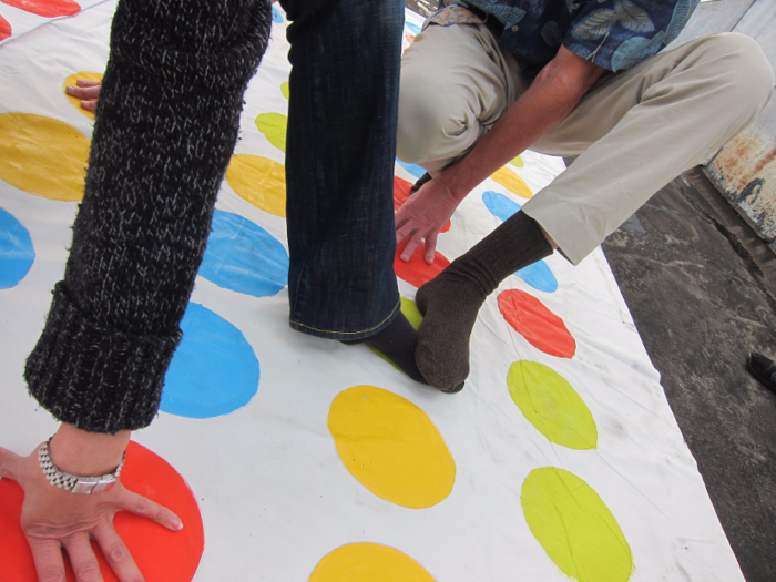 TWISTER: Twister is a game that children and adults enjoy on two very, very different levels.