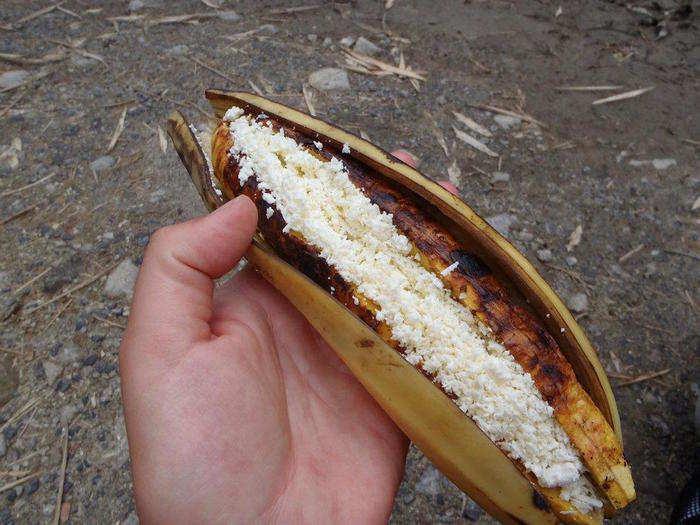 Festa recommends trying Choclo con Queso, grilled corn on the cob with sprinkled cheese — it is a popular street food that