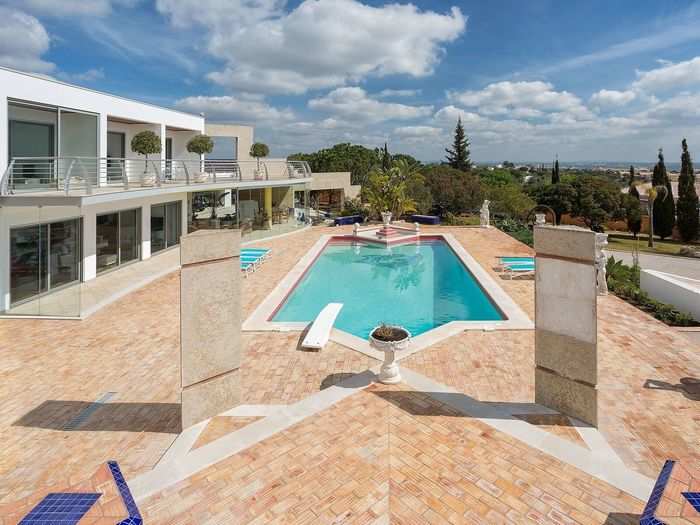 Four bedrooms can accommodate eight guests at "Monte Do Olival" in Algarve, Portugal. Lavish features include a large outdoor pool, terraces and patios with ocean views, a full kitchen, washing machine, dryer, an outdoor shower and a barbecue. Parking for four cars is available, but shops, restaurants, cafes and the beach are within walking distance.