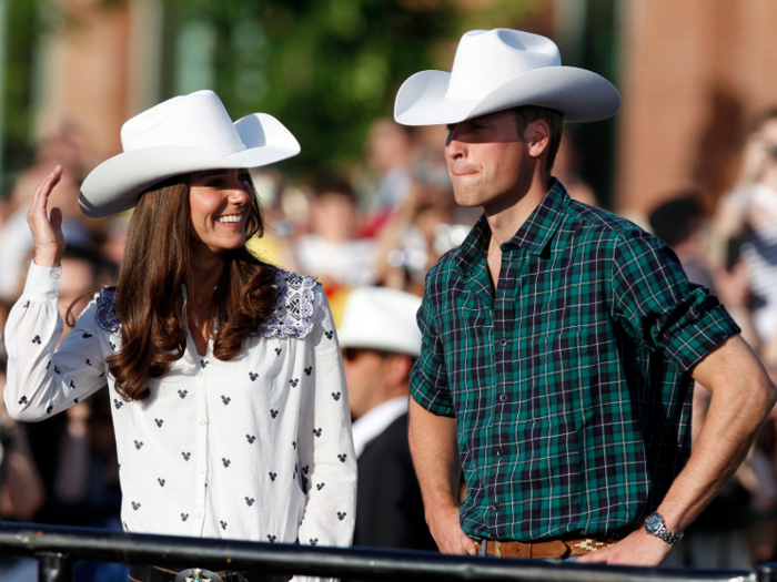 The royal couple donned some cowboy hats for a reception in Calgary.