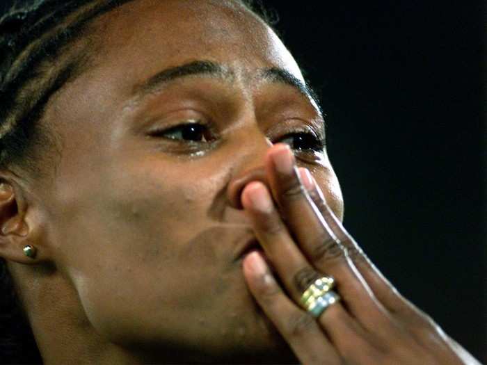 American sprinter Marion Jones reacts after winning the 100 meter final at the Sydney Games.