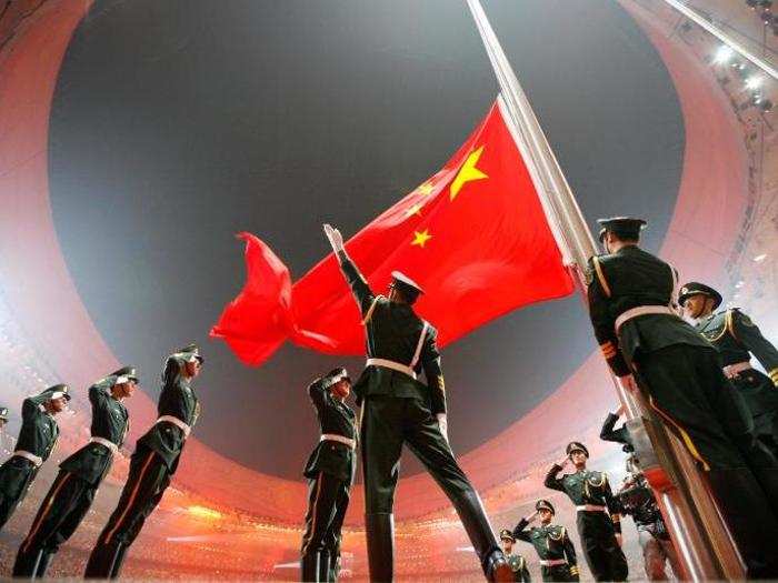 The Chinese flag is raised during the opening ceremony at the 2008 Summer Games in Beijing.