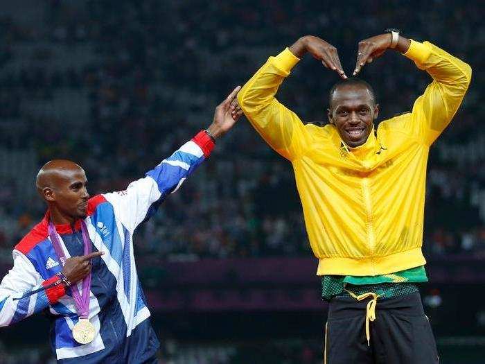 Distance runner Mo Farah and sprinter Usain Bolt switch victory poses after both winning gold at the 2012 London Games.