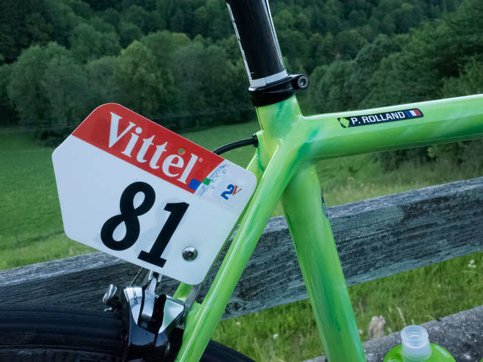 Every rider in the Tour gets a race number that is attached to their frame. The "2V" indicates Rolland