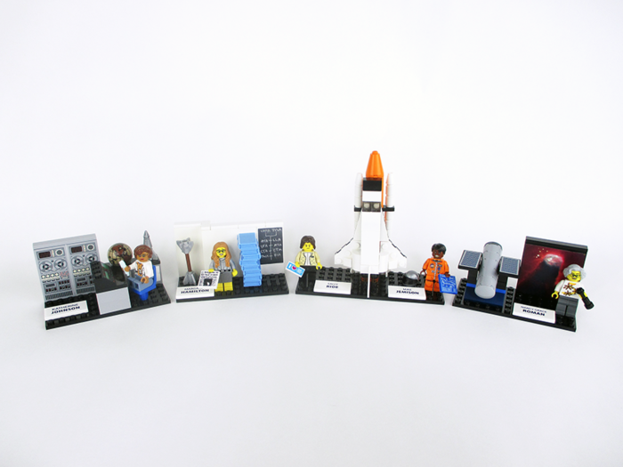 In addition to the minifigures, the full Lego set includes individual vignettes of a micro-scale Hubble Space Telescope, a space shuttle, instruments of the Apollo era, and a replica of a famous photo showing the code that got astronauts to the moon.