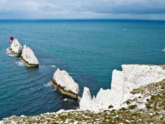 8. "The Needles," on the Isle of Wight, are made up of three separate chalk stacks. The furthest stack is attached to an automated lighthouse.