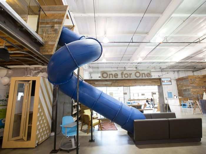 The Toms office in Los Angeles comes with a big blue slide, motivational signs, and all the wood embellishments you could ask for. Another plus: It