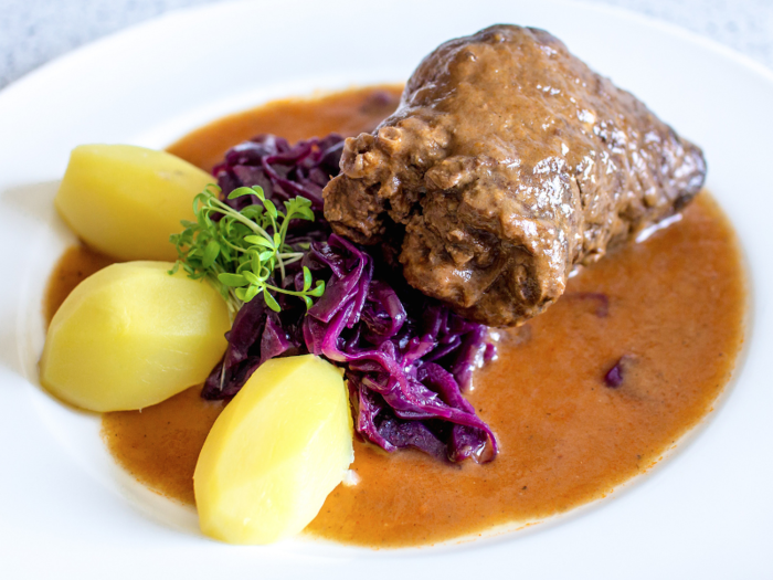 A common beef dish throughout the country, rindsrouladen (beef roulades) are thin slices of beef wrapped around bacon and onion, and sometimes pickles. Rotkohl (braised red cabbage) is often served as a side.