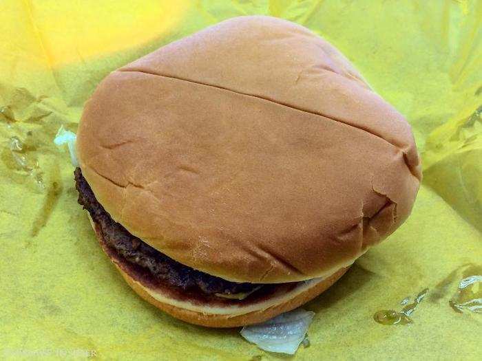 First, the simple Whataburger. Only the one single patty peeks out from beneath the wide, flat bun.