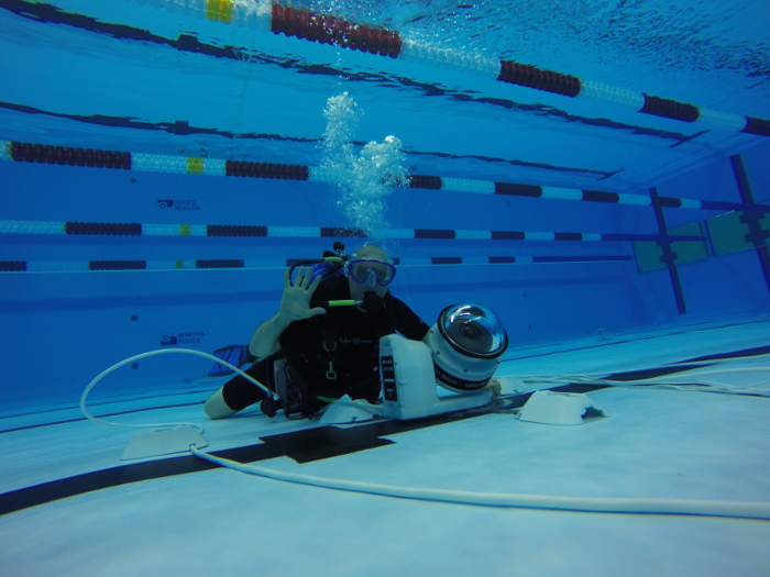 Then, he and his team run wires from the camera out of the pool and into a computer nearby. From there — thanks to robotic technology — they