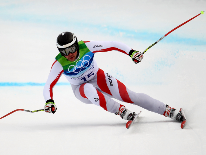 "I think downhill ski racing is one of the hardest things to [photograph]," Bello said. "You have to ski with 60 pounds of gear on your back, on the same mountain that the skiers are on."