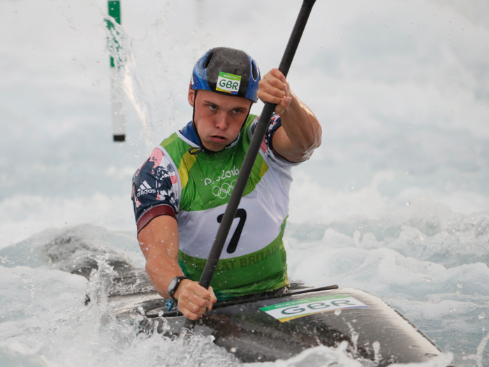 Joseph Clarke of Great Britain paddles through a kayak heat.