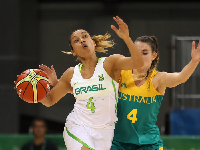 Adriana Pinto, left, and Tessa Lavey fight for the ball in a women