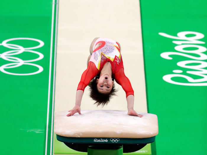 Mai Murakami of Japan launches into a vault.