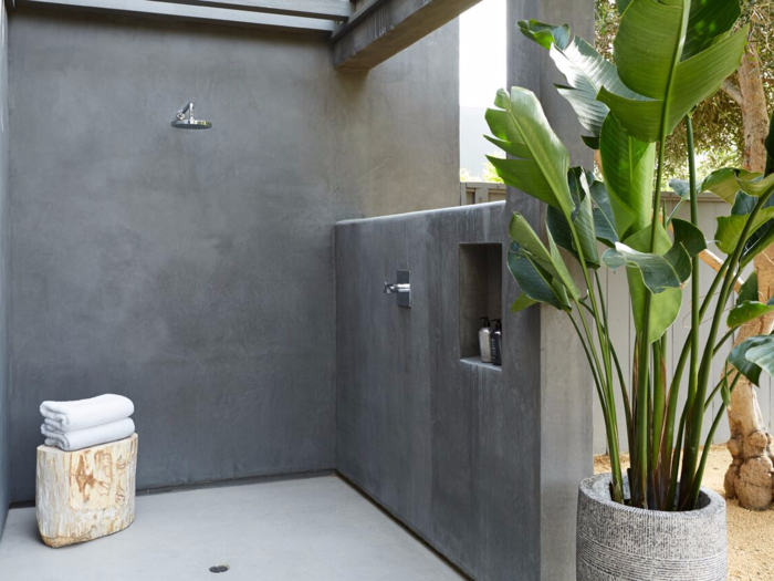 Gorgeous outdoor facilities invite residents and visitors alike to enjoy the good weather and natural surroundings. This pristine outdoor shower is perfect for a post-pool rinse.