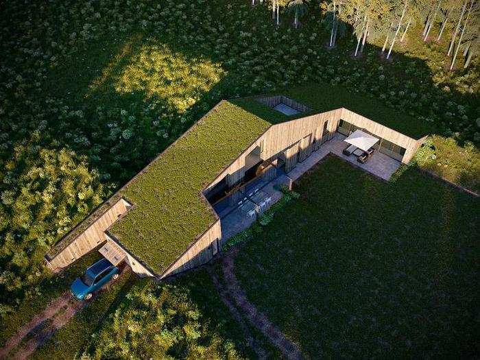 A sloped, grass-covered roof will help the mansion tuck right into Diepenheim