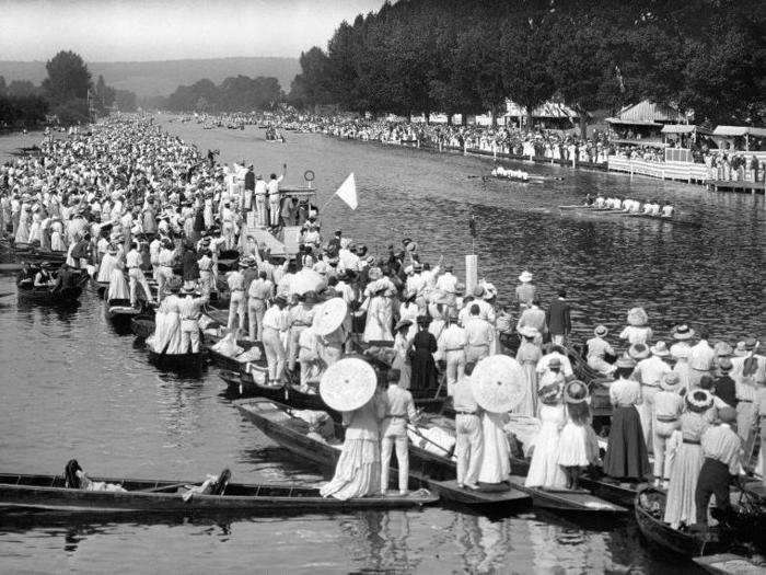 London, 1908: The eruption of Mount Vesuvius? in 1906 meant the games were relocated from Rome to London on financial grounds. This image shows spectators gathering as Great Britain, represented by the Leander club, beats Belgium to win gold in the rowing.