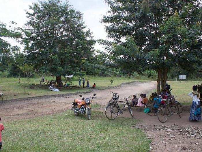 The health center, which is located off of a dirt road, serves 60,000 people in the subdistrict. It has a staff of 18 people, including the two midwives and several motorcycle taxi (known as "boda boda") drivers that are called upon to act as makeshift ambulances.