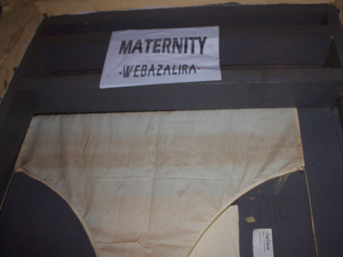 The hospital often has multiple deliveries at the same time, but its maternity room only has two beds. The midwives often use the only other bed, located in a consultation room, and also put extra mattresses on benches for the additional women in labor.