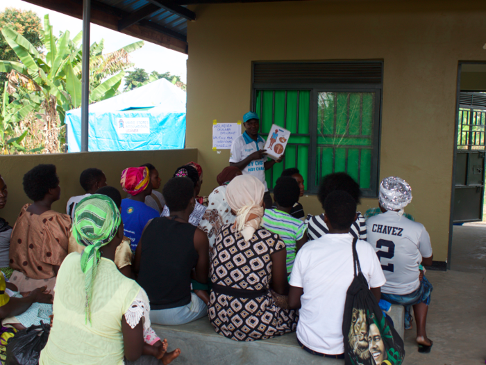 On this day, in the third building (the vaccination area), community health volunteers educate women about their family planning options. These women have come from across the subcounty, walking upwards of 30 km (18.6 miles) to get there.