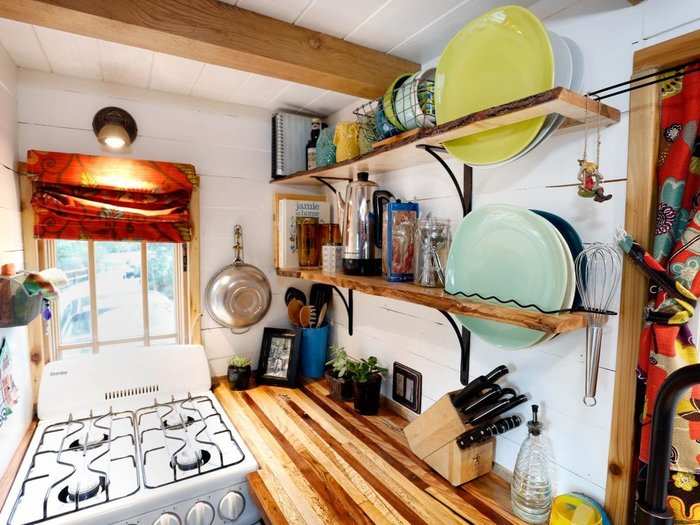 Add wall-mounted shelves to display and store your things.