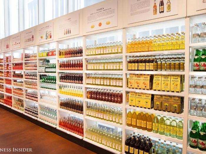 Various imported Italian products, including soft drinks and tomato sauces, line the walls.