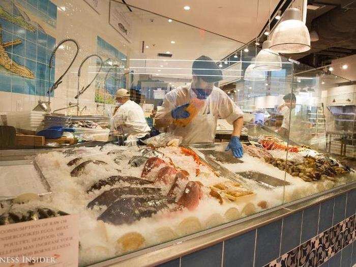 Fresh seafood and cut meats are available.