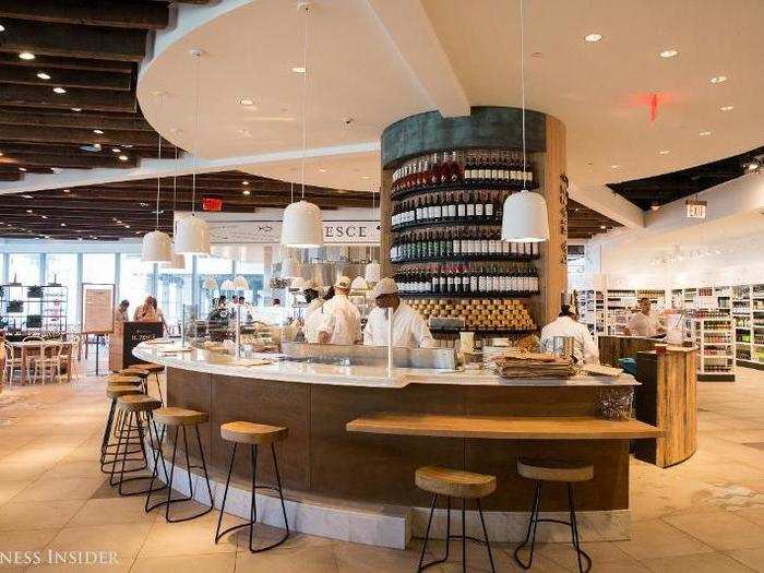 Cheese and wine are served at a round bar that sits in the center of the main dining area.