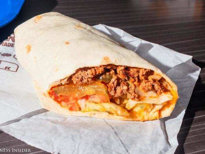 The ground beef within looks to be actually ground beef, not the mealy Taco Bell corollary. Hints of cumin and pepper waft up from the fresh burrito. Recognizable seasonings that aren