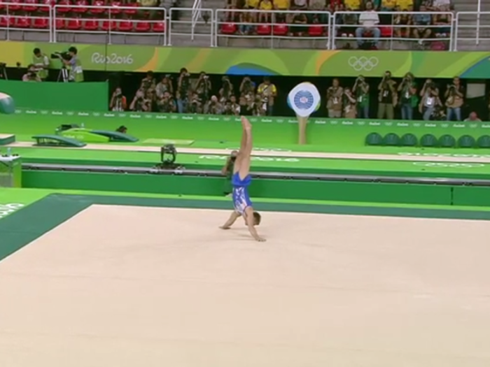 He moved from the pommel into a much more relaxed-looking handstand.