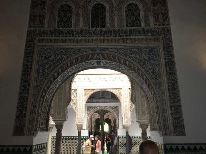 The rows of arches keep going throughout the palace. They lead visitors out to the royal gardens, where some of the most dramatic views and scenes from the show take place.