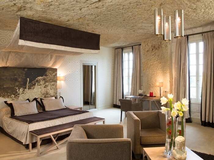 For a more modern take on a troglodyte dwelling, Les Hautes Roches is a five-star hotel constructed inside a limestone cliff. The lavishly decorated rooms overlook the Loire River.