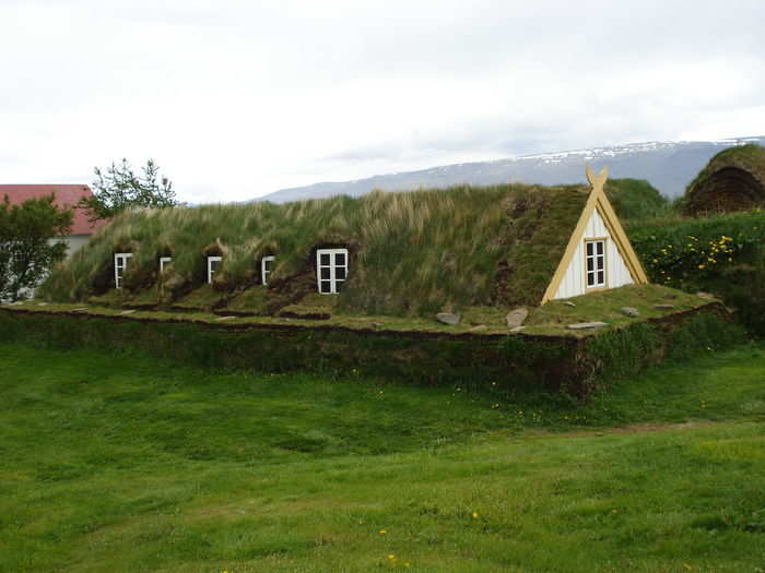 This home in Glaumbær, Iceland is an example of a "turf house"— a highly-insulated building that has a stone foundation and layers of turf built around the sides.