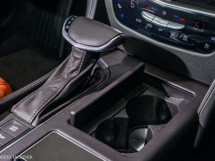 The straightforward P-N-R-D shifter is a refreshing throwback, a welcome departure from the fiddly joystick setups that have become too common in luxury cars. Note the modest cupholders.