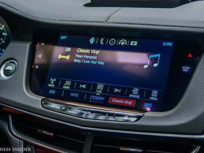 The central touchscreen infotainment system is brilliant. Running Cadillac Cue, I think it