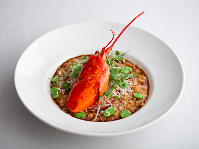 SIGNATURE DISH — Lobster risotto, rocket salad & sauce Americaine